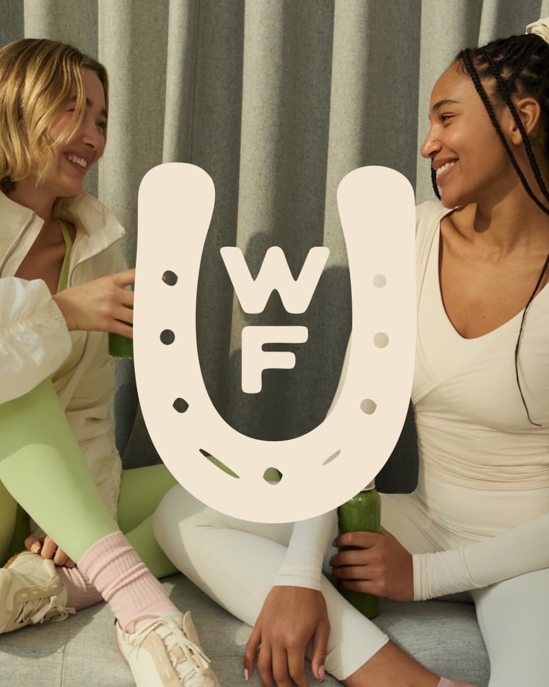 Wild Form horseshoe mark over a social movement image of two women in cream and green.