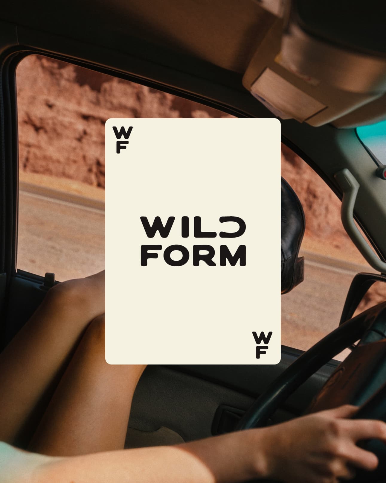 Wild Form logo card placed over an editorial image of western boots beside a car.