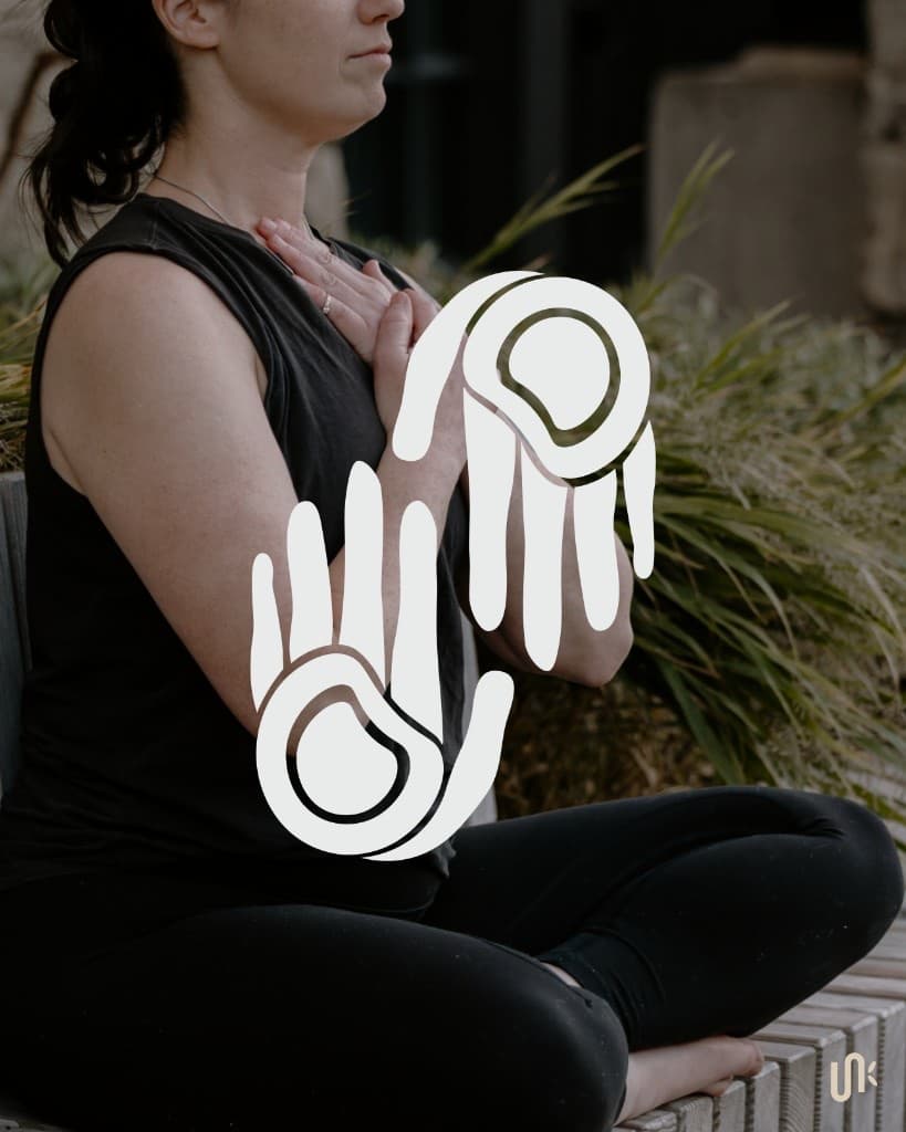 Inhalo twin-hands ritual mark over a seated breathwork practice outdoors
