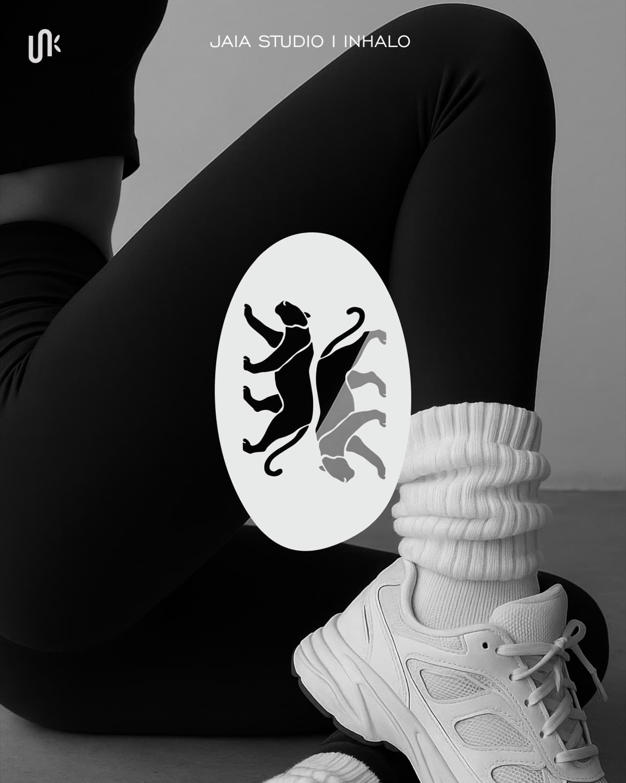 Inhalo twin panther mark over black and white athletic footwear photography