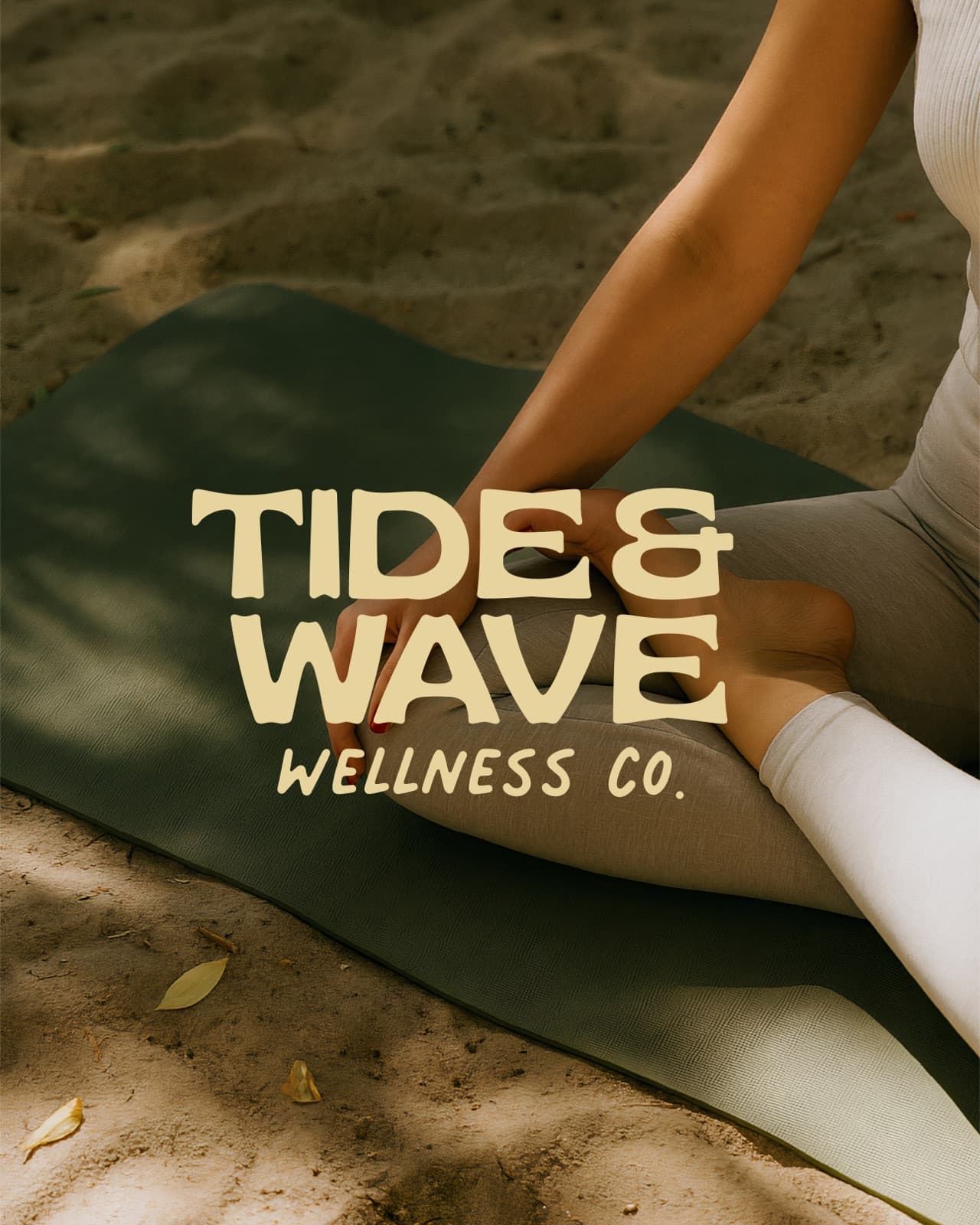 Tide And Wave Wellness Co. wordmark over outdoor yoga on a forest green mat