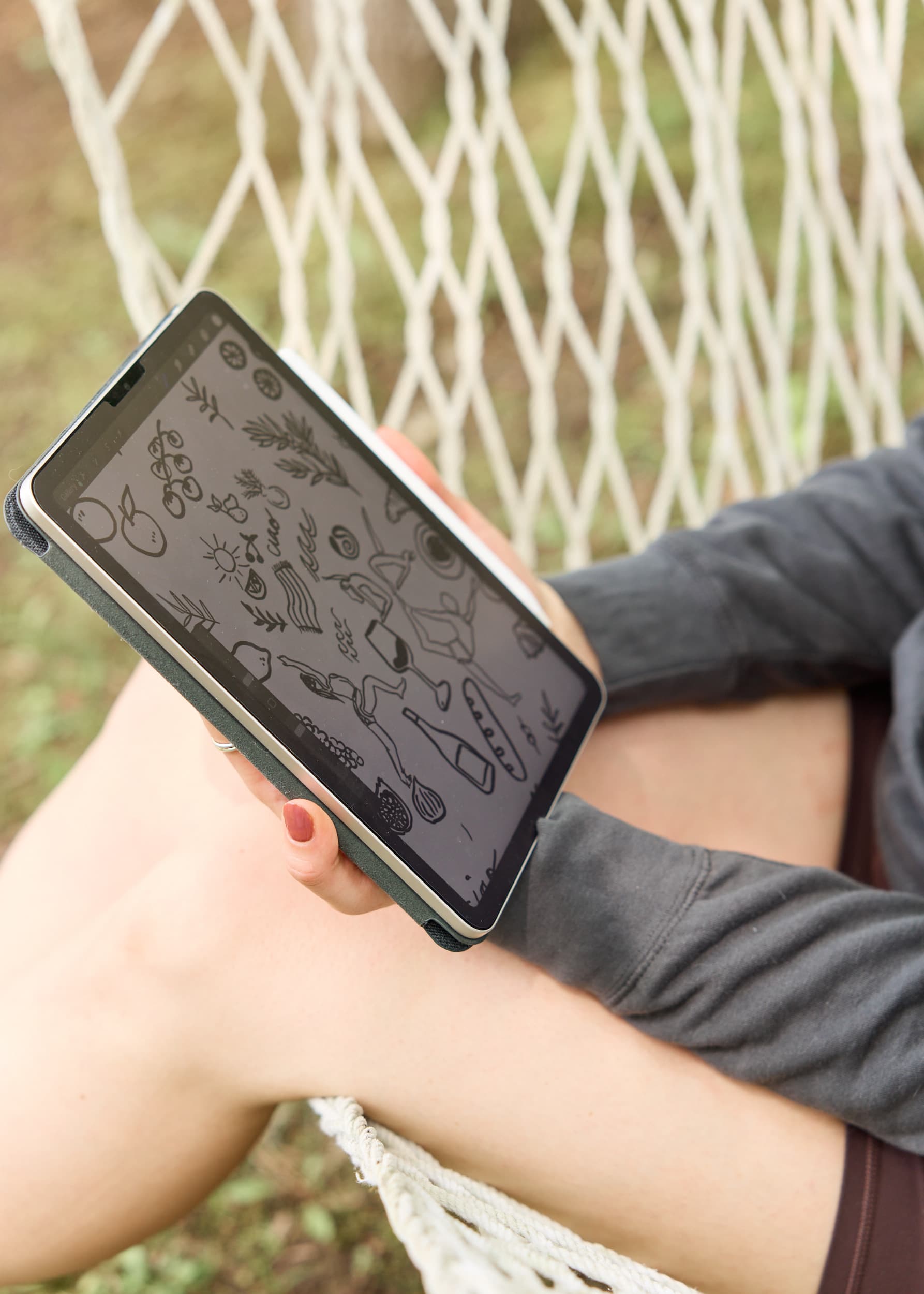 Design exploration on a tablet during a focused outdoor studio session