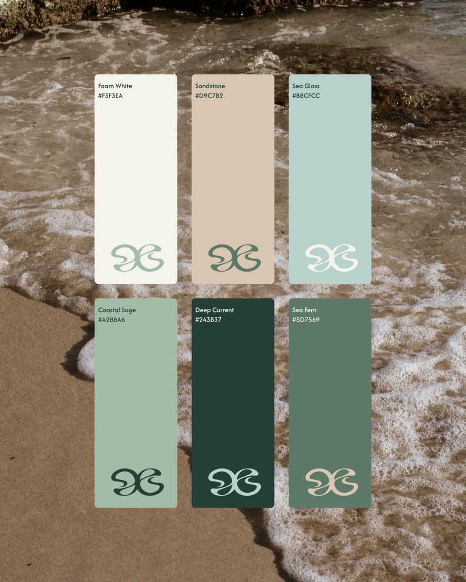 Foam White, Sandstone, Sea Glass, Coastal Sage, Deep Current and Sea Fern swatches over coastal water.