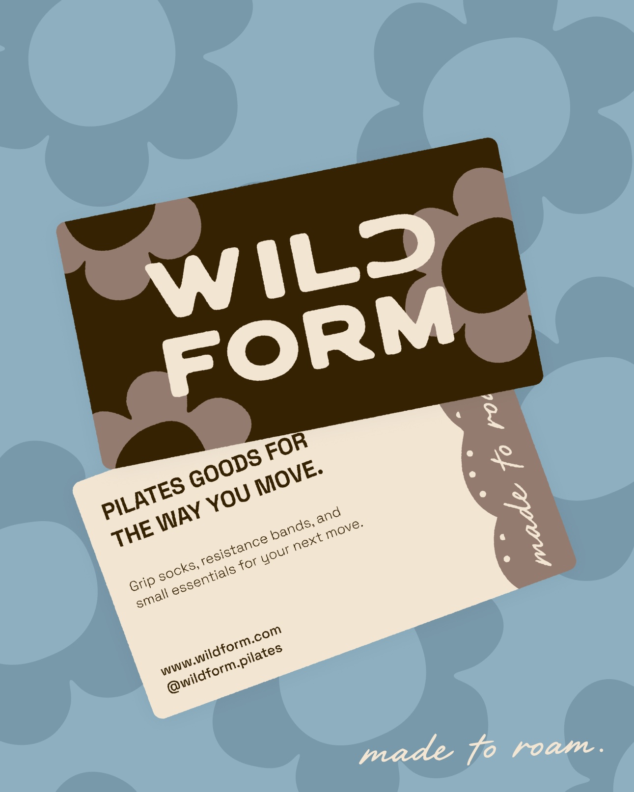 Wild Form club card and made to roam message on a playful blue floral background.