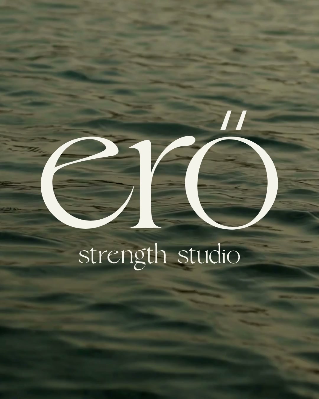 White erő Strength Studio logo over green water.